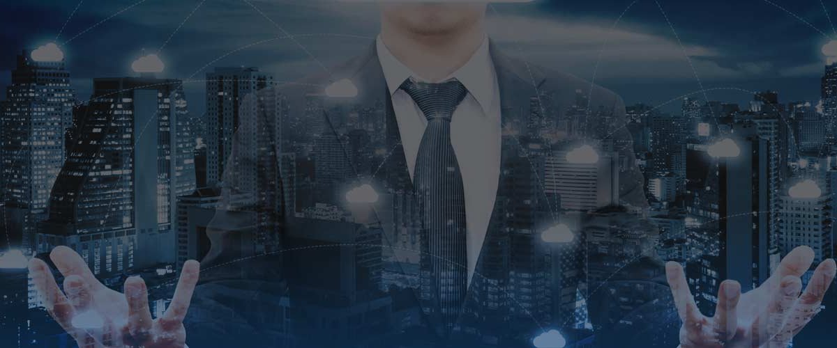 Interconnected cloud icon graphic superimposed over businessman and city skyline
