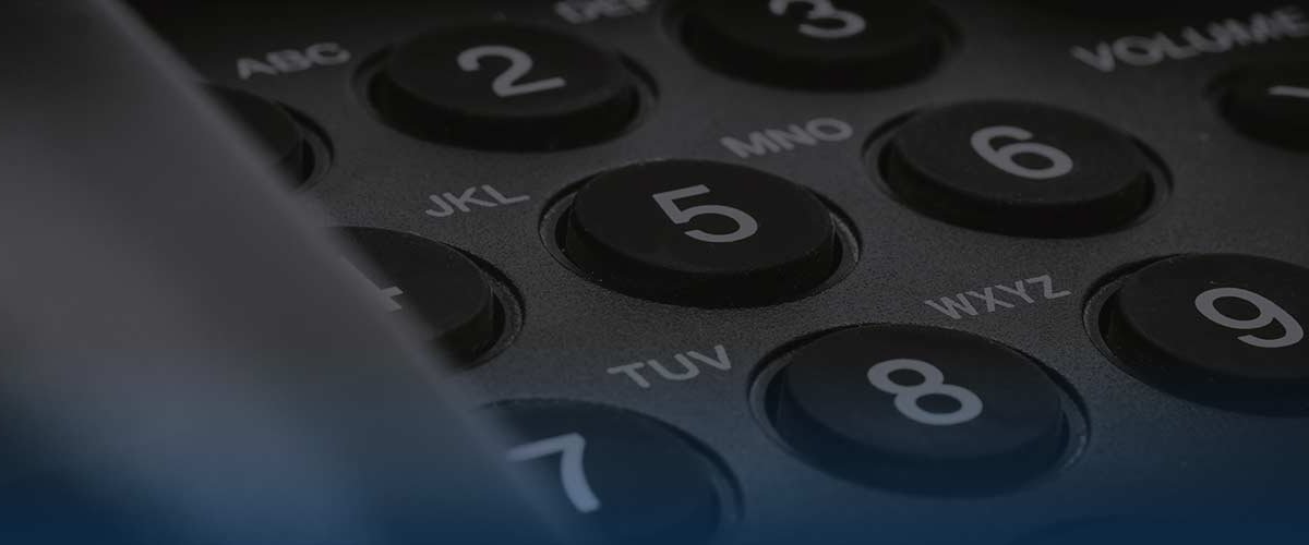 Closeup of office phone number buttons
