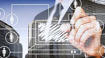 Interconnected people icons graphic superimposed over businessman with pen