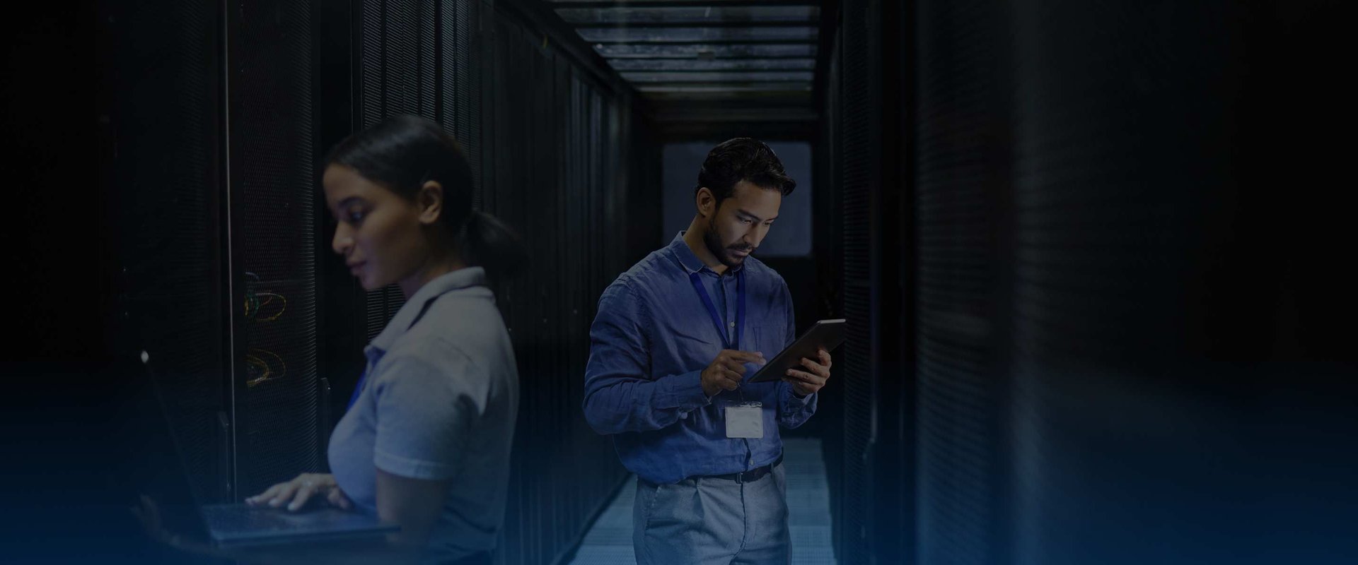 Data Center Female System Administrator and Male IT Specialist